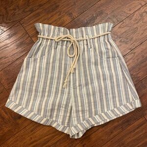 Blue, tan, and white paper bag linen shorts
